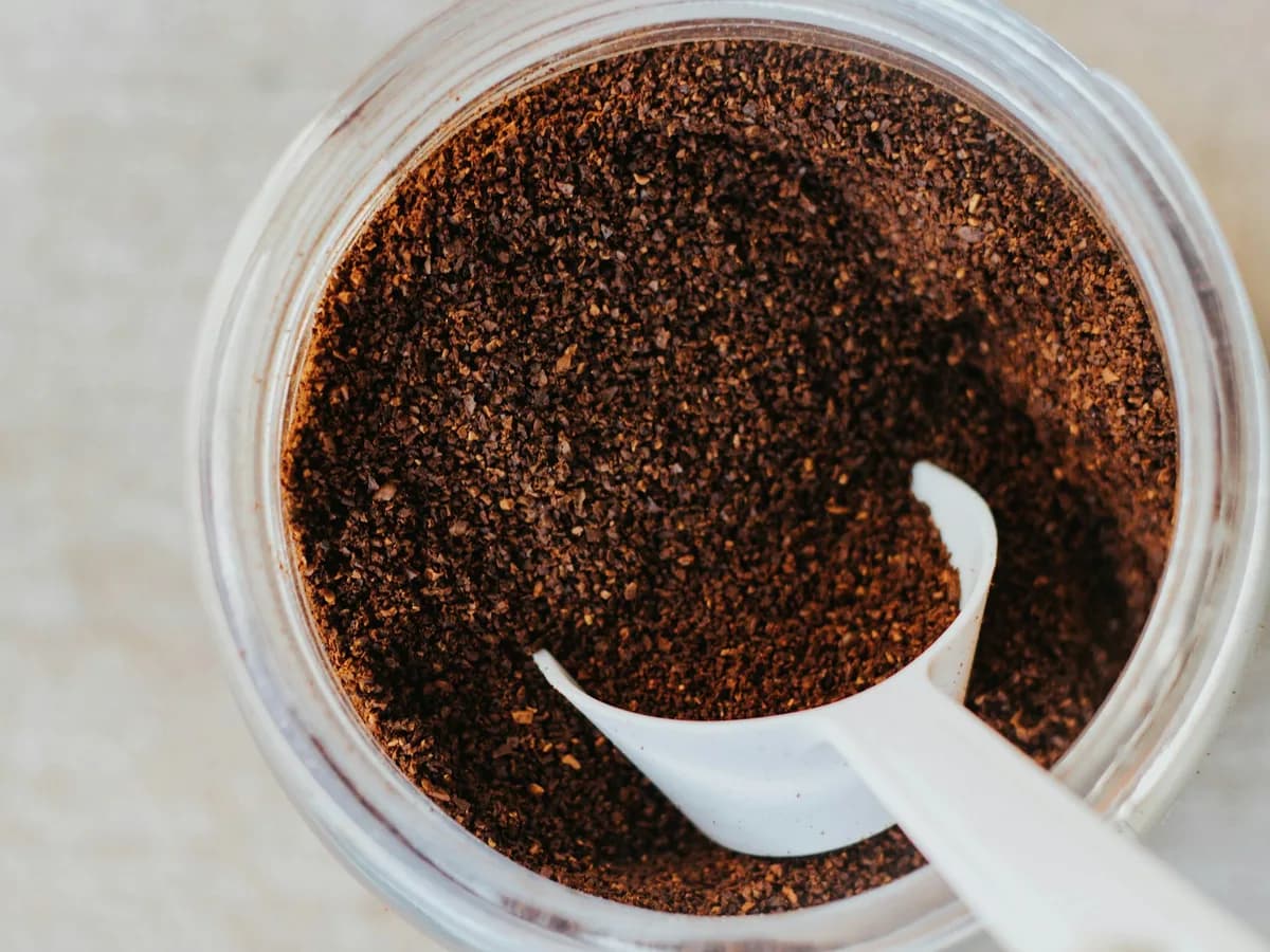 Ground coffee in a jar, seen from above