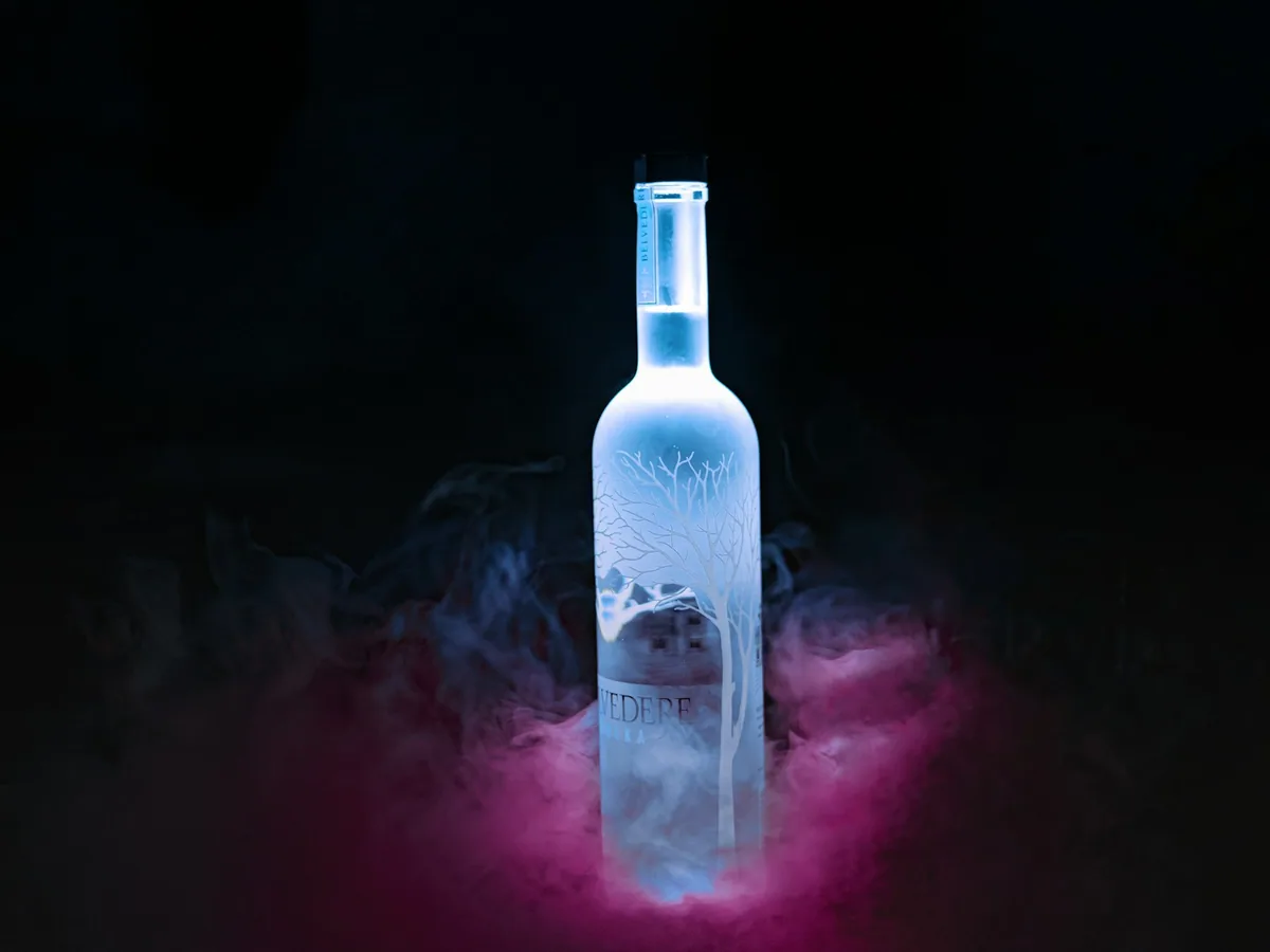 A frosted vodka bottle in smoke
