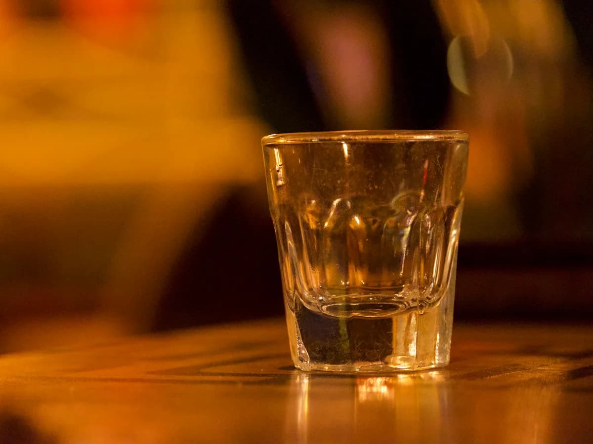 A glass of whisky in warm light