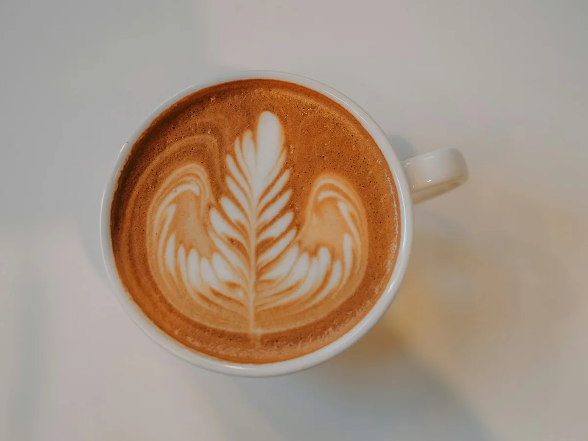 A latte with foam art seen from above