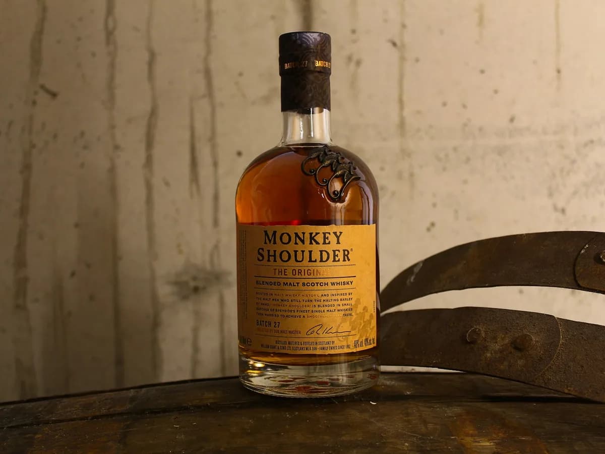 A bottle of Monkey Shoulder against a grey ground