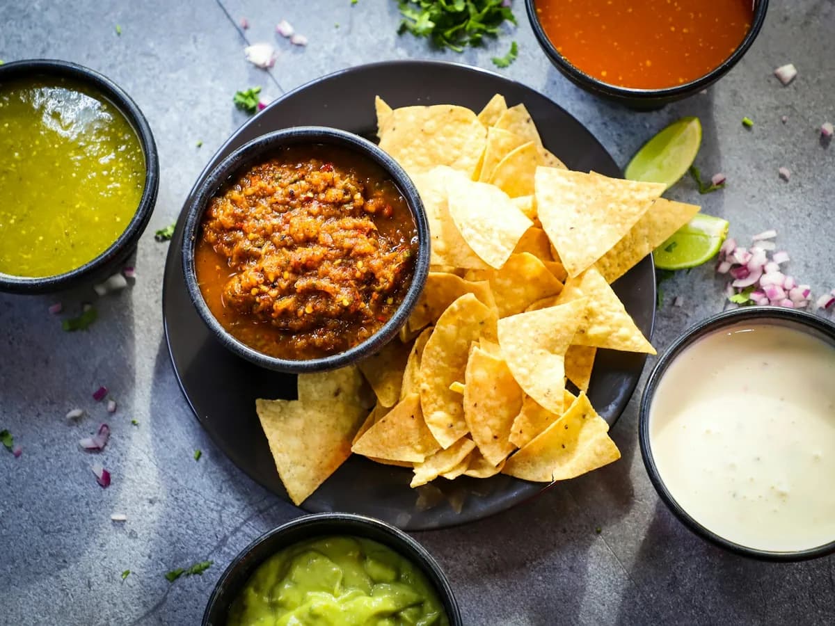 Totopos with three salsas, seen from above